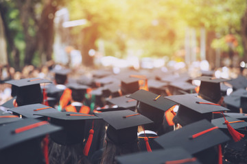 backside graduation hats during commencement success graduates of the university, concept education 