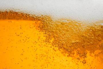 beer background with bubble froth texture foam pouring alcohol soda in glass happy celebration party