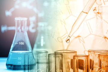 Wall Mural - dropping chemical liquid to test tube with lab glassware, science or chemistry research and developm