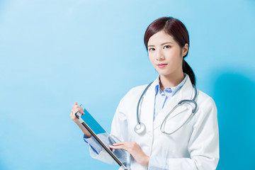 Wall Mural - woman doctor take tablet pc