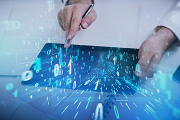 Poster - Man hand with tablet, binary code