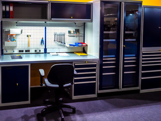 Poster - Shelf with the tool. Crafting table. Work place. Storage Tool. Armchair by the table. Engineering works. Service maintenance.