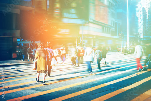 Fotomural walking people on the busy city street with sunlight effect