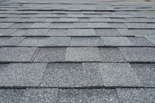 Close Up On New Installed Roof Shingle 
