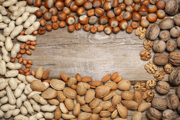 Wall Mural - Variety nuts on old wood