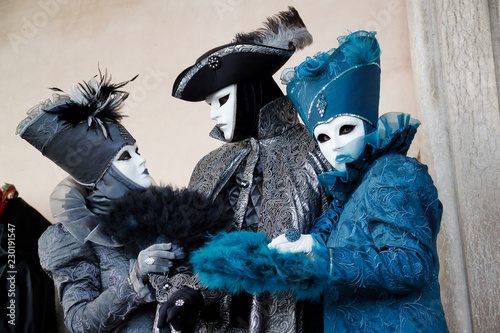 Fotomural Colorful trio carnival black-blue mask and costume at the traditional festival i