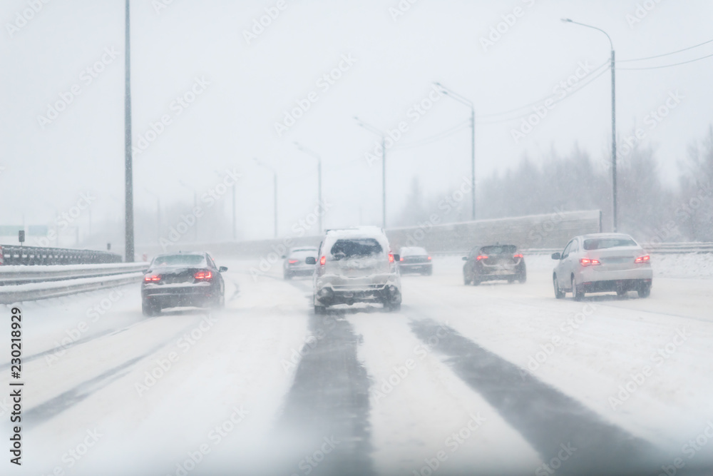 Winter Storm Traffic. Highway During Snow Storm. Heavy Snowfall and ...