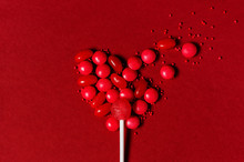 Heart Of Red Candy On The Red Background