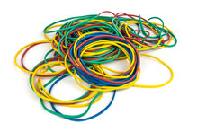 A Pile Of Multi-colored Rubber Bands For Money On A White Background, Isolated