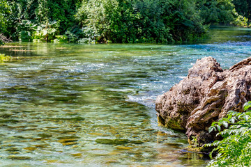 Beautiful turquoise spring Blue Eye a.k.a. Syri i Kalter near the town of Muzine in Albania. The spring has crystal clear waters and is the start of the river Bistrice