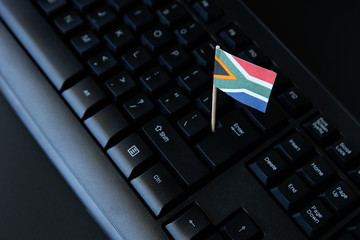 South Africa online business concept image consisting of a flag and keyboard. 