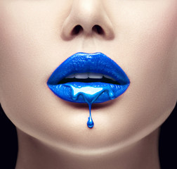 Poster - Blue lipstick dripping. Lipgloss dripping from sexy lips, Blue liquid drops on beautiful model girl's mouth, creative abstract makeup