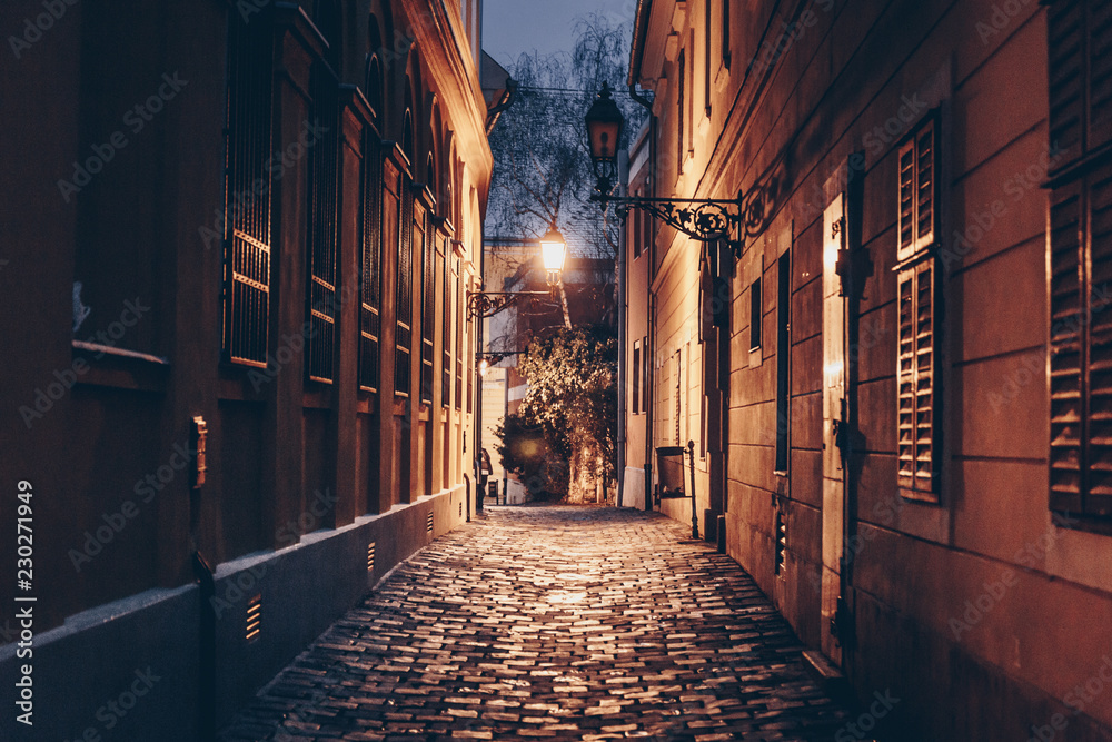 Old town street at night in Budapest, Hungary - obrazy, fototapety, plakaty 