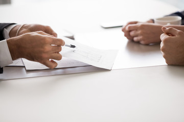 Poster - Signing contract, man indicates where to put signature. Successful negotiations, discussion of terms and conditions, consulting. Close up. Hands view