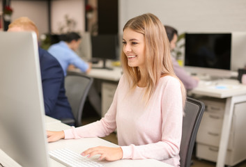 Sticker - Young woman working in modern office