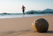 Сoconut on the beach and the running man