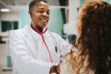 Wall Mural - Physician examining a female patient