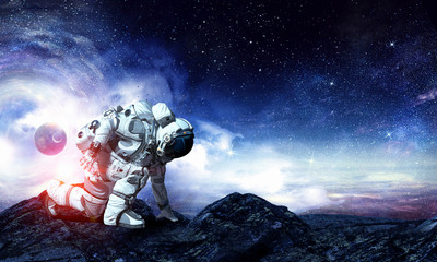Wall Mural - astronaut starting to run. mixed media