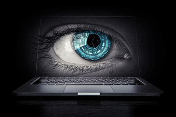 Female eye from laptop