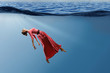 © Sergey Nivens - Woman dancer in clear blue water