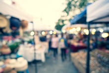 Abstract Blurred Image Of Day Festival Or Flea Market With Light Bokeh For Background Usage.