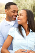 © digitalskillet1 - Portrait of a Happy African American couple smiling and hugging.