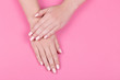 © alimyakubov - Stylish trendy female pink manicure.