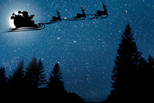 Silhouette Of A Flying Goth Santa Claus 