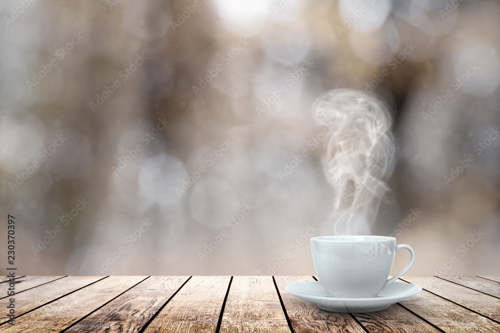 Obraz na płótnie hot coffee on the table on a winter background w salonie