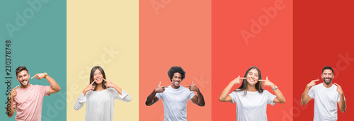 Fotomural Collage of different ethnics young people over colorful stripes isolated background smiling confident showing and pointing with fingers teeth and mouth