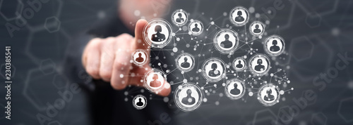 Cuadros en Lienzo Man touching a social network concept