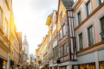 Wall Mural - Street view with ancient buildings and Great clock on renaissance arch, famous astronomical clock in Rouen, the capital of Normandy region