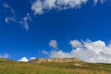 View of the mountain plateau in the clouds in the summer in the North Caucasus in Russia.