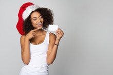 Happy Afro Woman Wear Santa Claus Hat With White Card