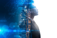 The Double Exposure Image Of The Businessman Thinking Overlay With Cityscape Image And Futuristic Hologram. The Concept Of Modern Life, Business, City Life And Internet Of Things