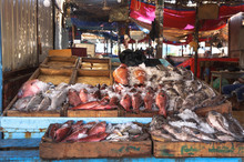 Various Fish In The Market Near The Sea, Ocean. Old Stalls With Fresh Marine Life. Asia Culture And Traditions. Stock Photos