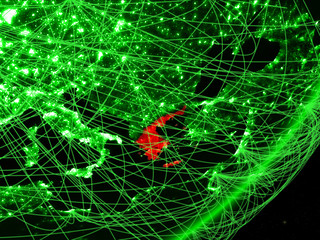 Greece on green model of planet Earth with network at night. Concept of green technology, communication and travel.