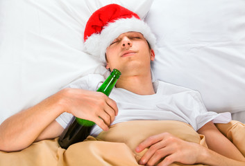 Canvas Print - Young Man sleep in Santa Hat