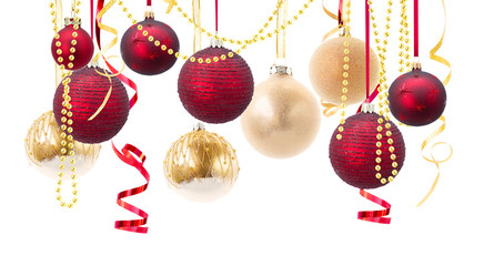 Canvas Print - Row of red and golden christmas balls with garlands isolated over white background