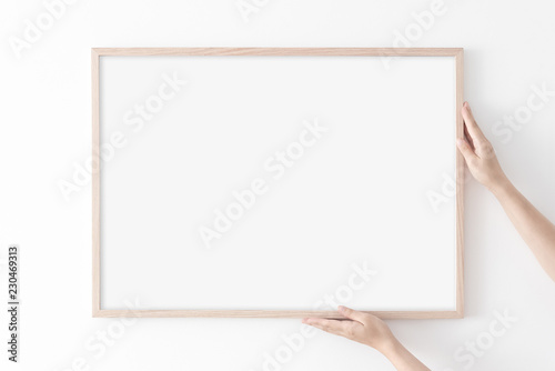 Landscape large 50x70, 20x28, a3,a4, Wooden frame mockup on white wall.  Poster mockup. Clean, modern, minimal frame. Empty fra.me Indoor interior,  show text or product Stock Photo | Adobe Stock
