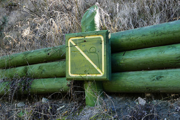 warning signs ban on hunting in the forest area,