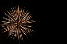 White Starburst Firework In Black Sky On The Fourth Of July