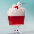 © Lori Eanes - Red gelatin dessert in glass with whipped cream and cherry