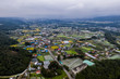 Aerial drone photo - The beautiful mountainous countryside of Japan.  The many rice fields, mountains, and villages of Gunma Prefecture.