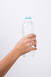 © stockfamily - Water bottle in woman's hand