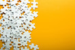 © Pixel-Shot - Pieces of jigsaw puzzle on color background