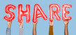 Hands showing share balloons word