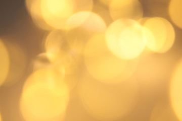 blurred yellow light bokeh , circle shape bright light at night .