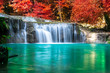 Amazing in nature, wonderful waterfall at autumn forest in fall season. 