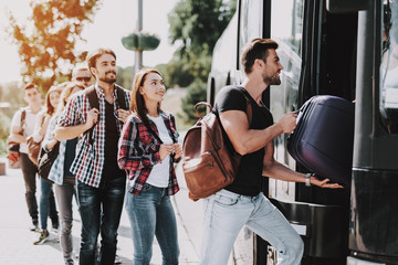 Wall Mural - Group of Young People Boarding on Travel Bus